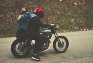 riding modern bobber bike